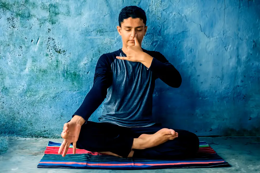 a man doing Pranayama breathing technique.