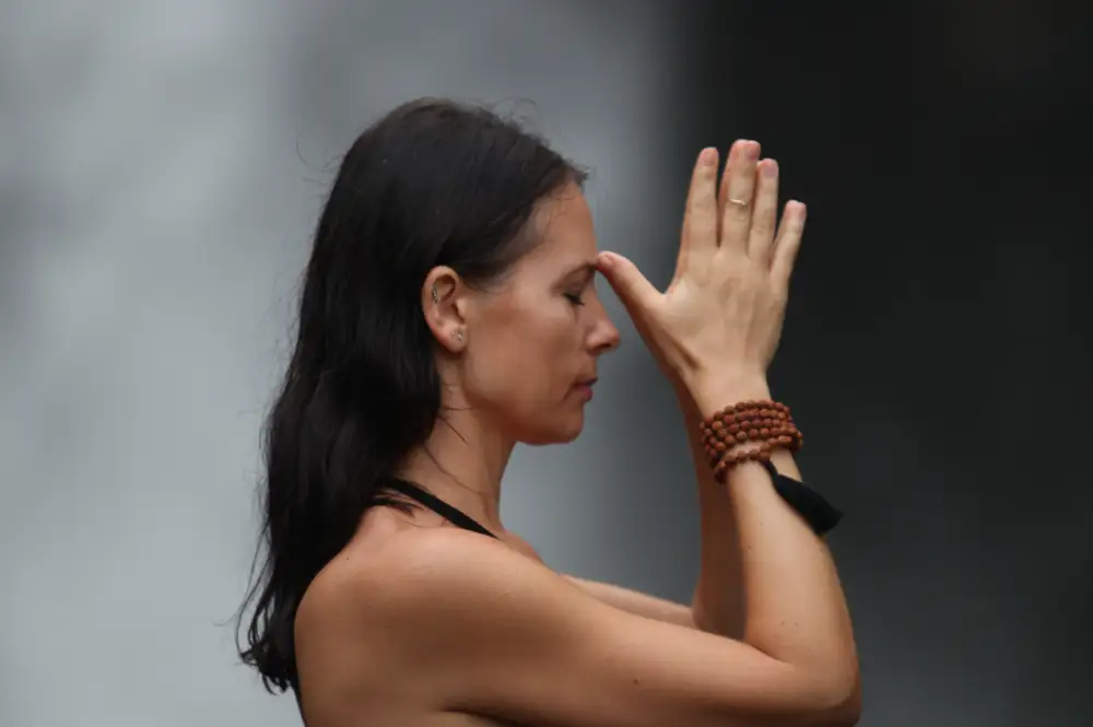woman giving thanks and gratitude.